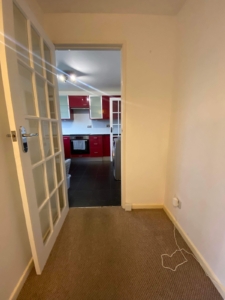 old kitchen and hallway before renovation