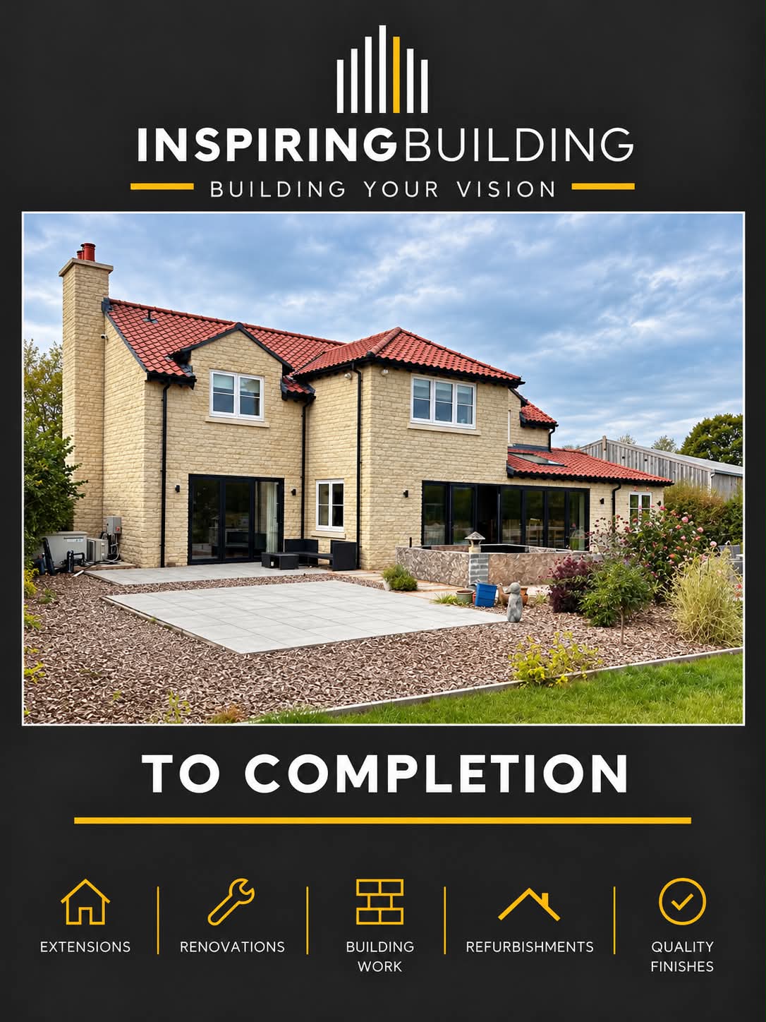 Completed rear elevation of the stone Cotswolds home with glazing and an outdoor terrace.